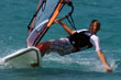 young child windsurfing in Mikri Vigla, Naxos